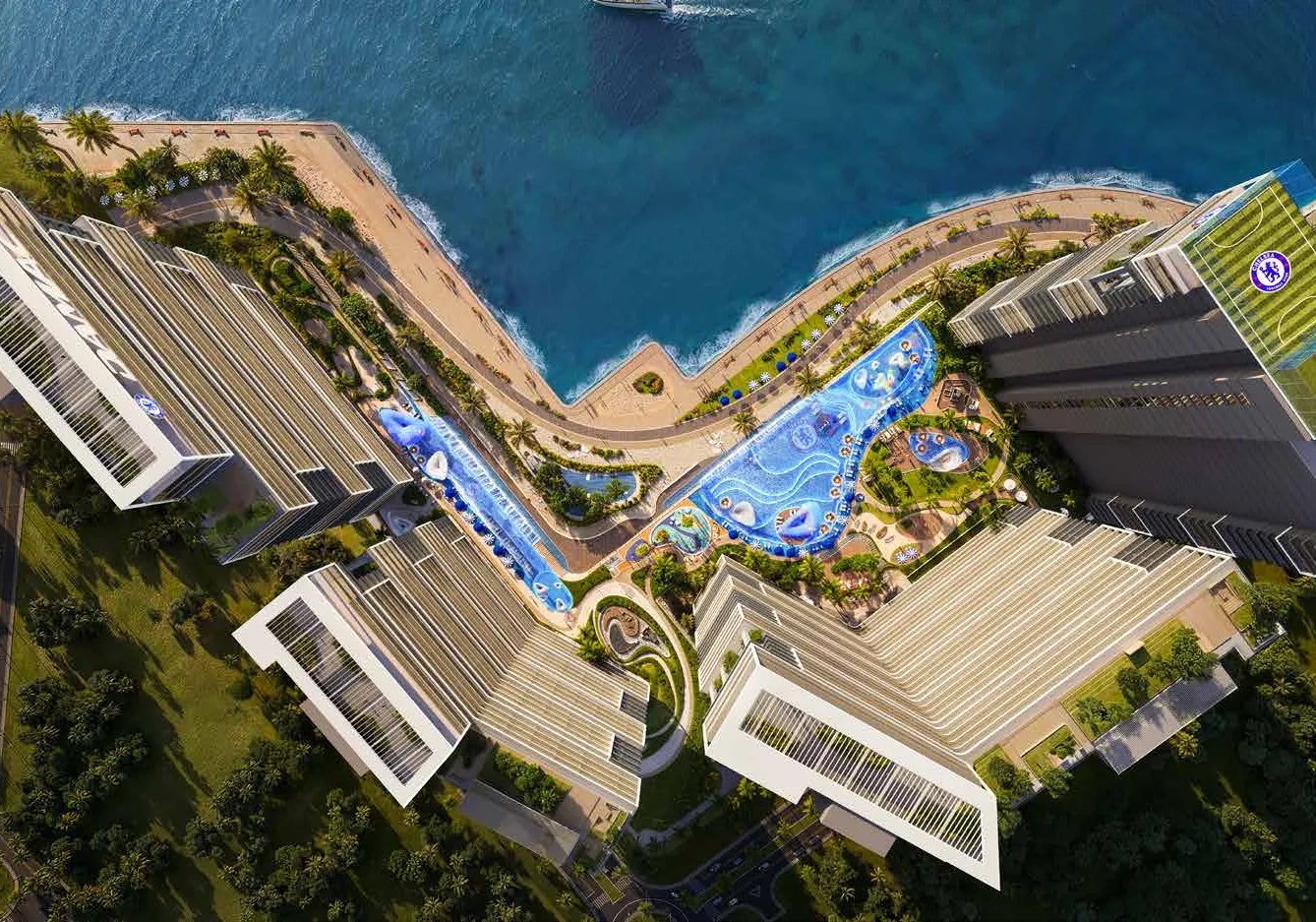 Aerial view of the six towers, pools and the seafront promenade